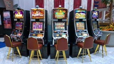 ajo89 slot mobile app interface showing slot games and live casino options